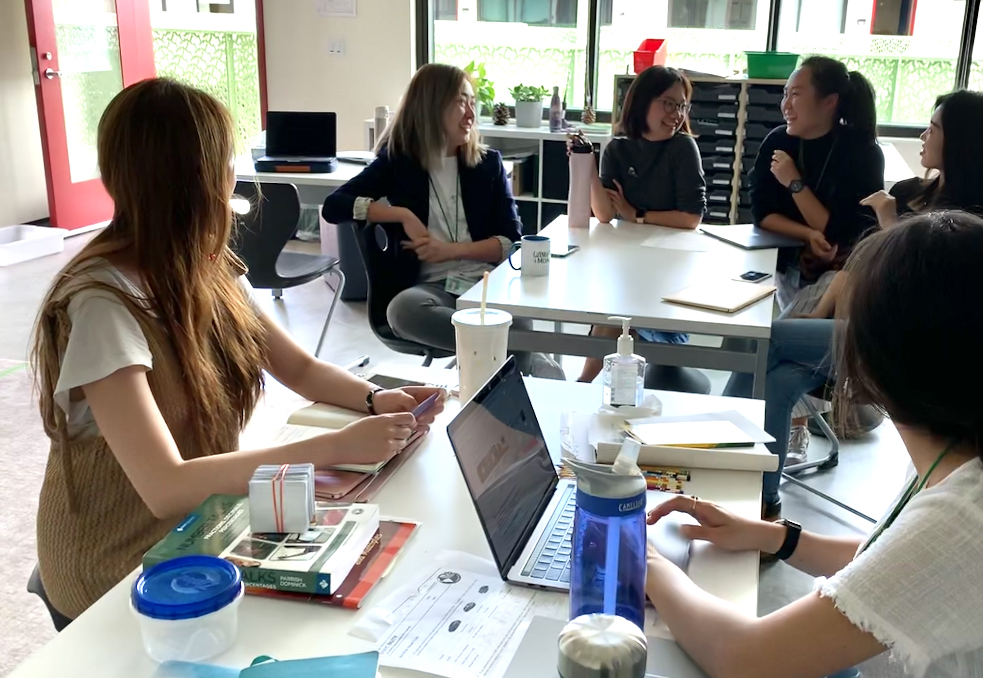   Teachers sharing take-aways after observing each other’s classes.  