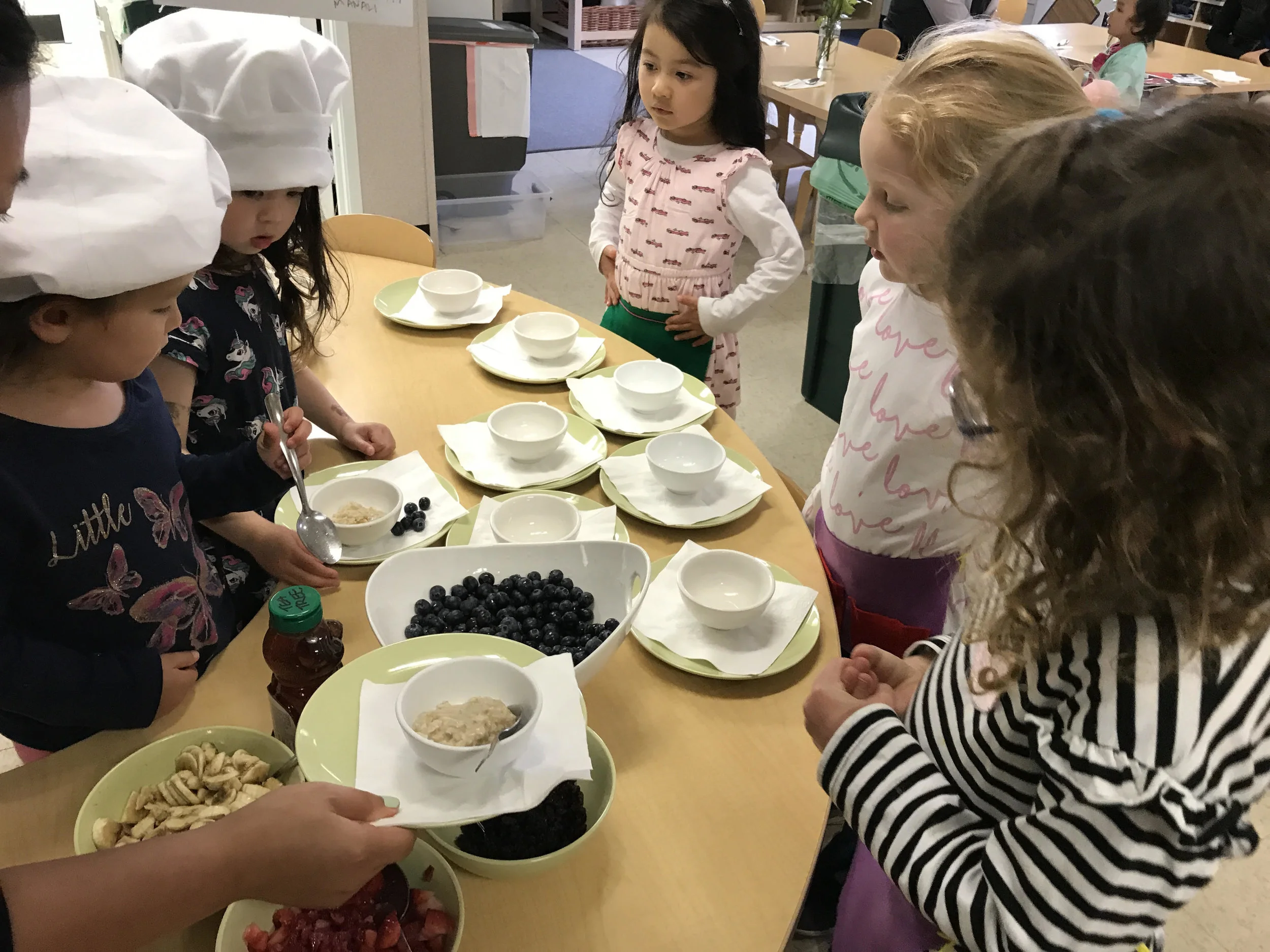  The cooks were busy in the kitchen making the dish of the day: oatmeal. 